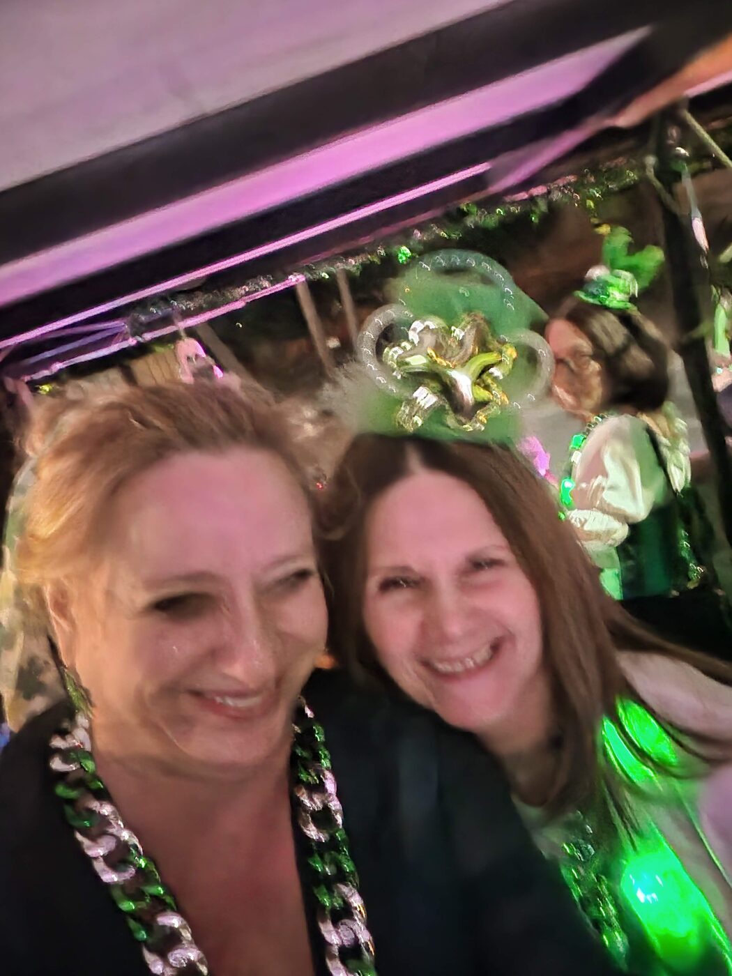 Two smiling Krewe members